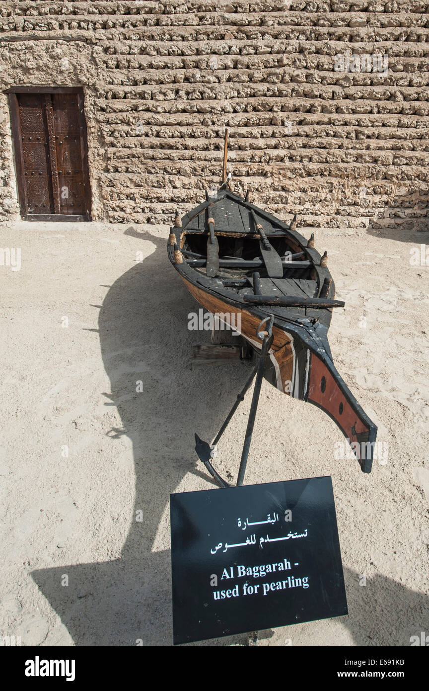 Al Baggarah boat canoe used for pearling pearl diving in the Dubai Museum, Dubai, United Arab Emirates UAE. Stock Photo