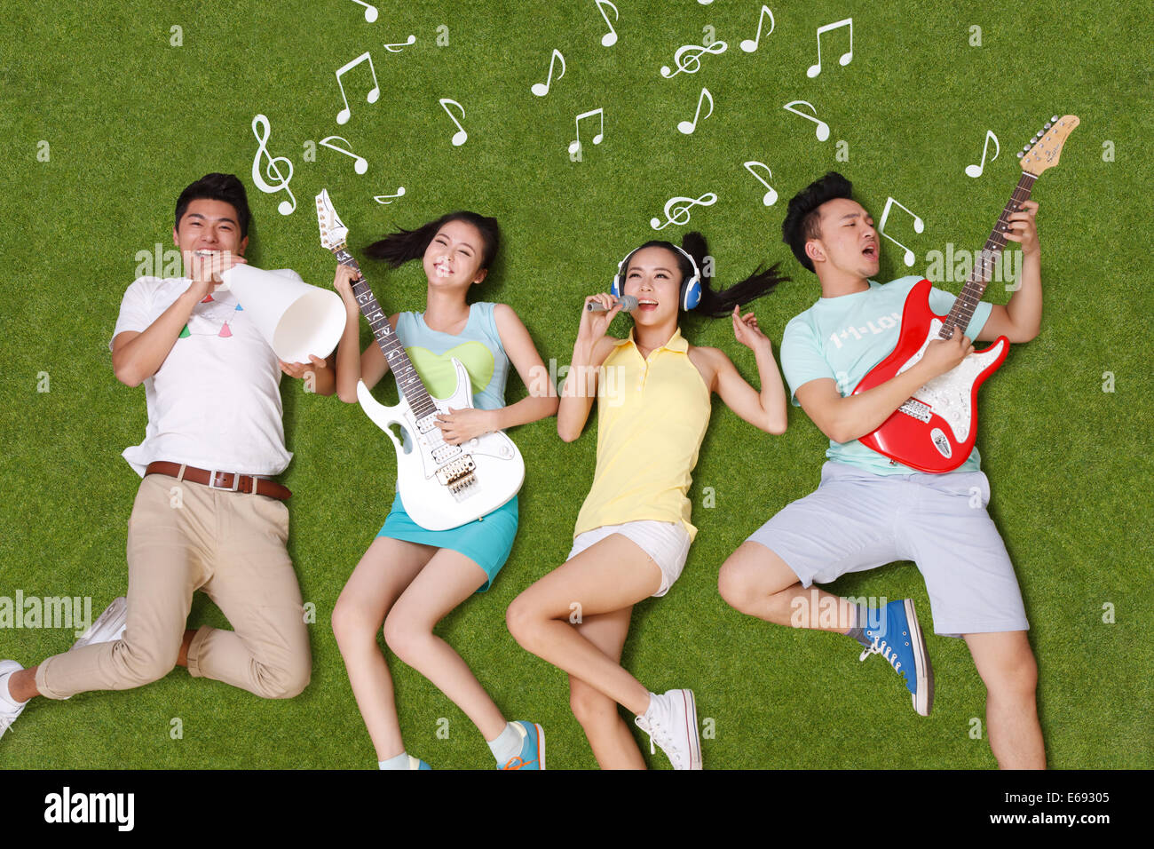 Adult women playing instruments singing hi-res stock photography and ...