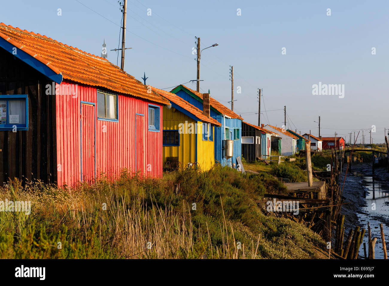 Oyster farmer cabins, La Baudissiere channel, Île d'Oléron, Charente Maritime, France Stock Photo