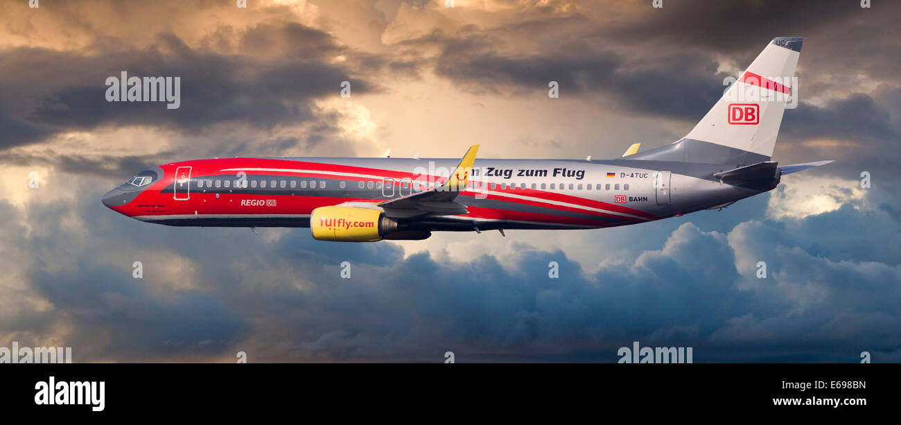 TUIfly Boeing 737-8K5 WL, Rail and Fly, with the slogan "Im Zug zum Flug",  German for "On the train to the plane", in flight Stock Photo - Alamy