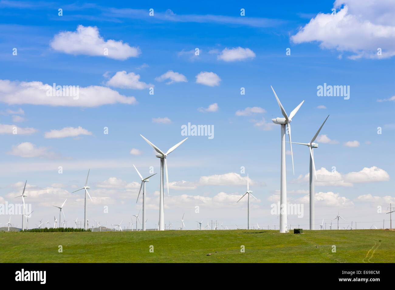 Environmental energy by wind turbines Stock Photo