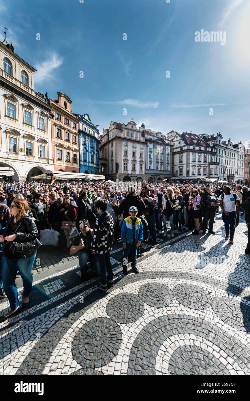 Crowd of people in front of the Old Town City Hall, historic buildings, Old Town Square, Prague, Czech Republic Stock Photo
