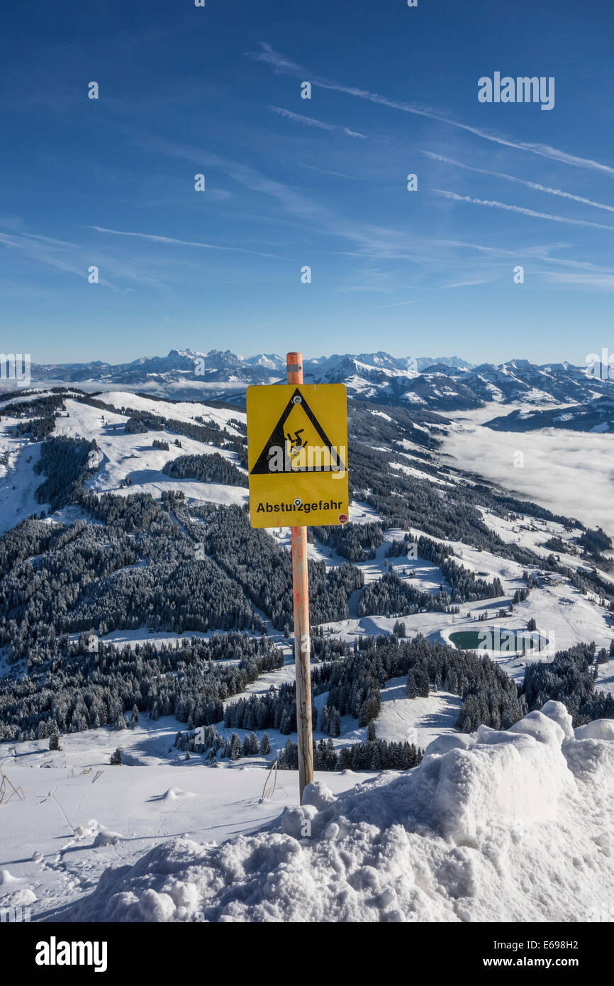 Absturzgefahr, Germa for 'fall hazard', sign in the Alps, Brixen im Thale, Tyrol, Austria Stock Photo