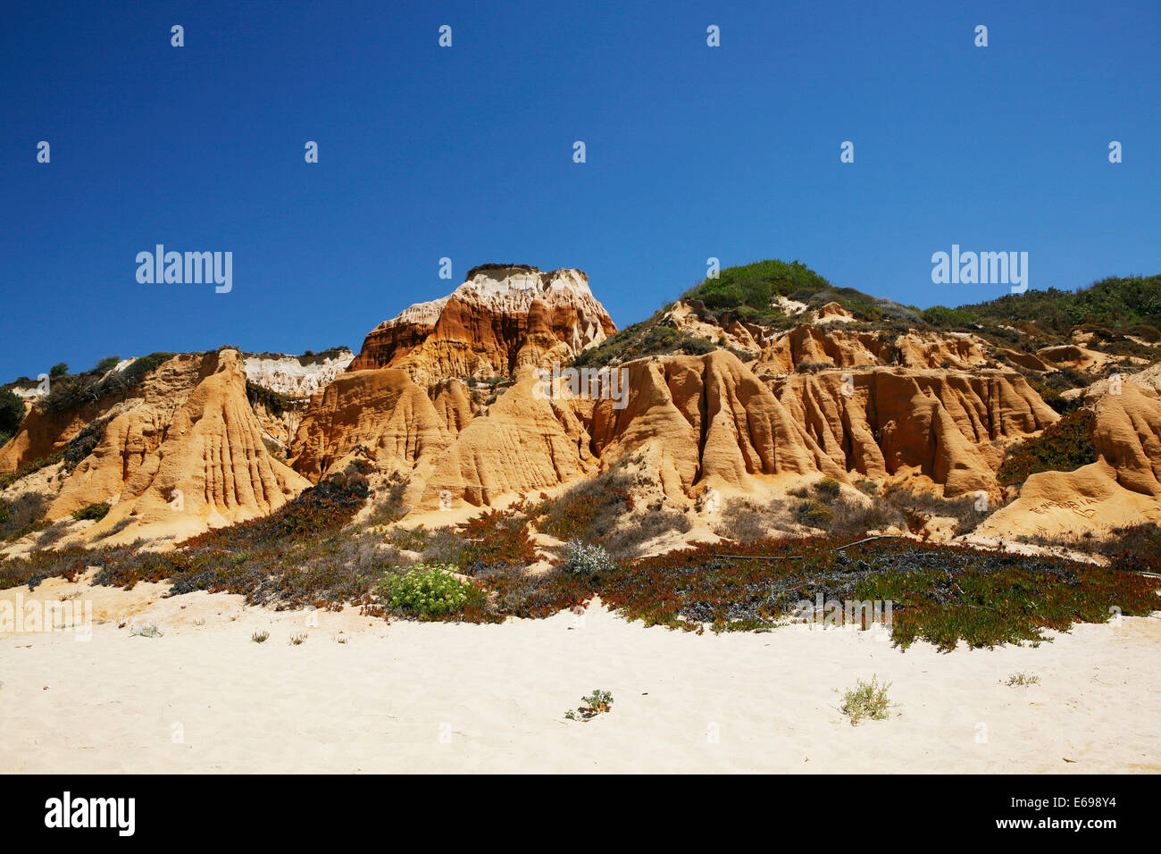 Sandstone rocks eroded by wind and rain, beach, Atlantic coast, near Melides, Portugal Stock Photo