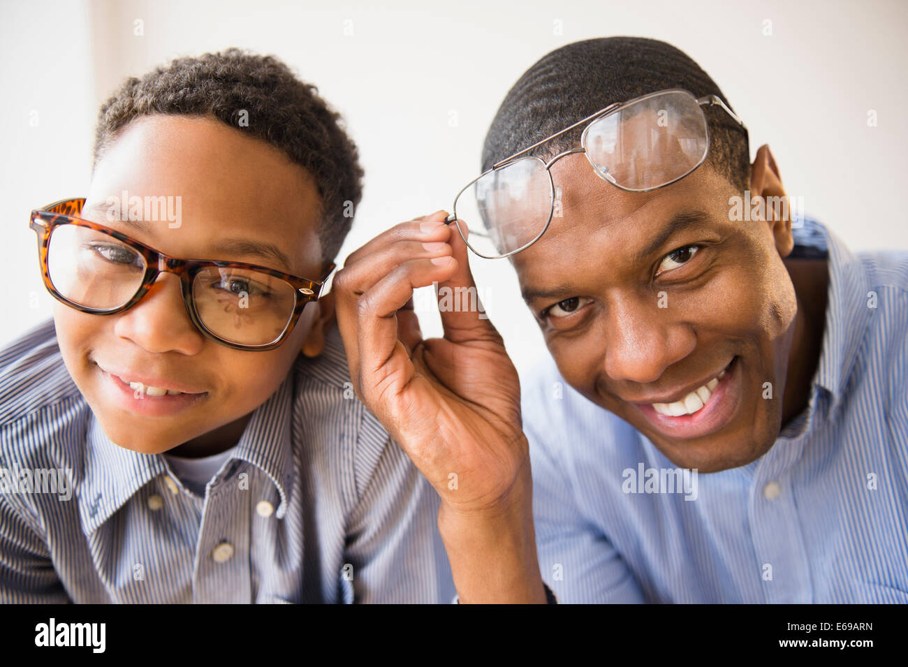 Father and son wearing glasses together Stock Photo