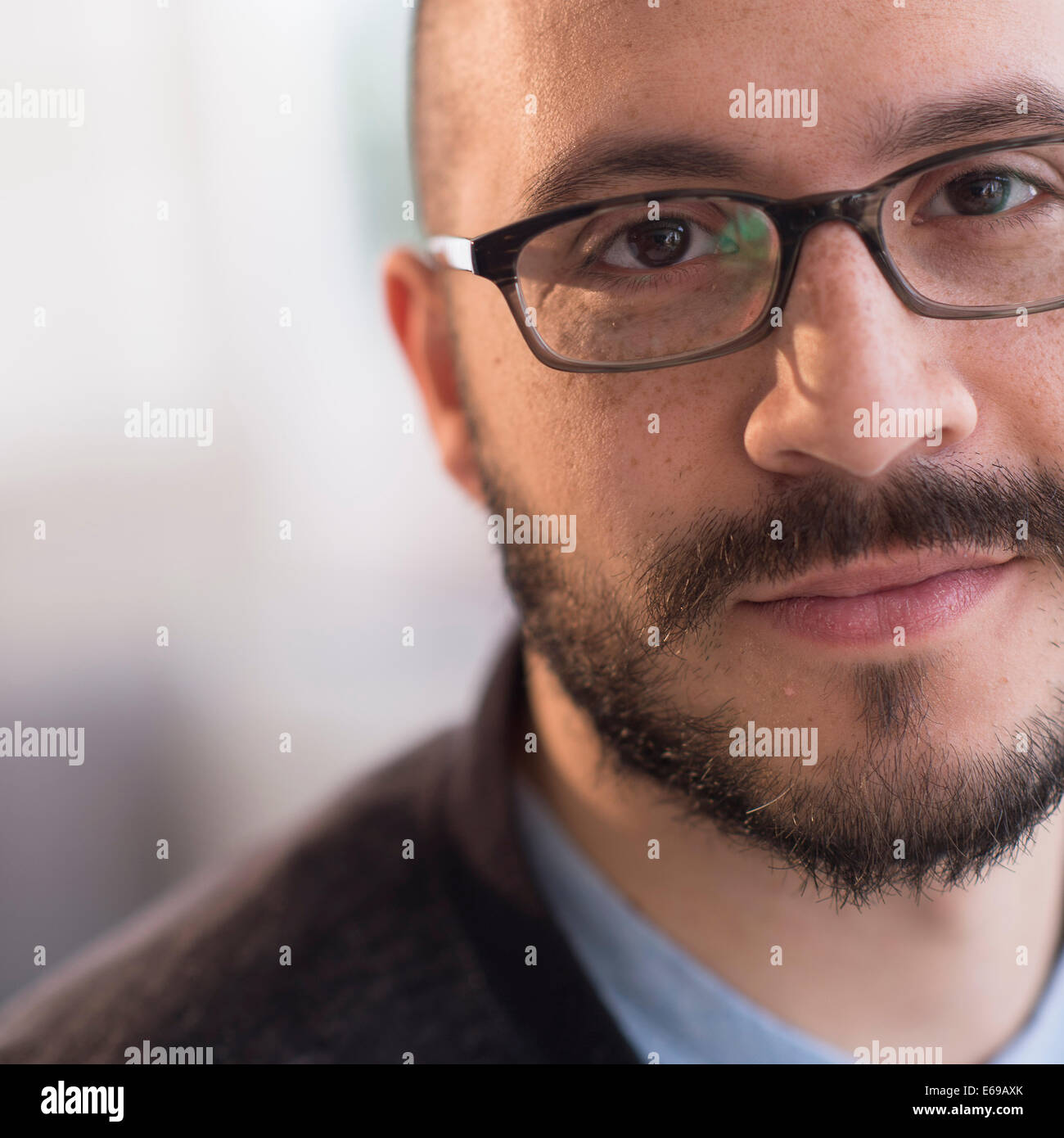 Hispanic man smiling in eyeglasses Stock Photo