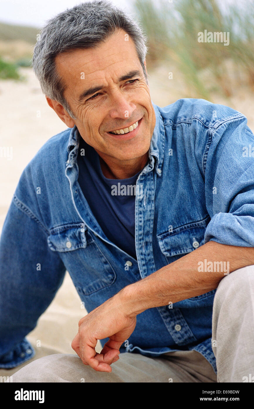 Adult man smiling on coast hi-res stock photography and images - Alamy