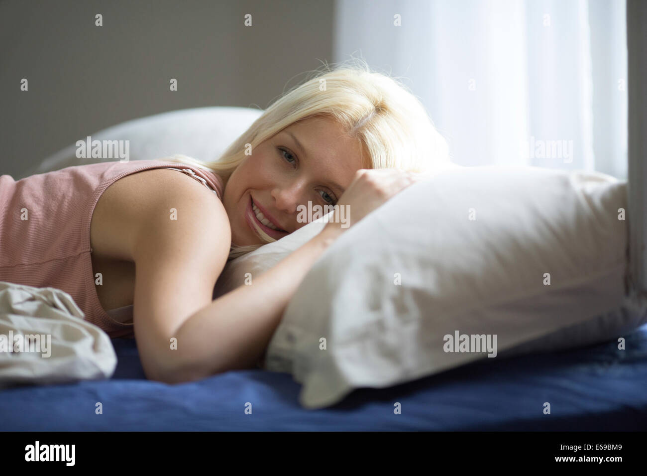 Women laying bed window hires stock photography and images Alamy