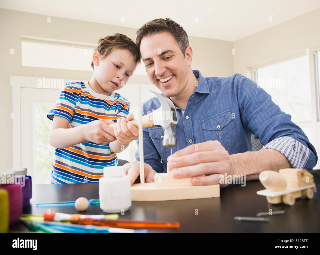 Father teaching son hi-res stock photography and images - Alamy
