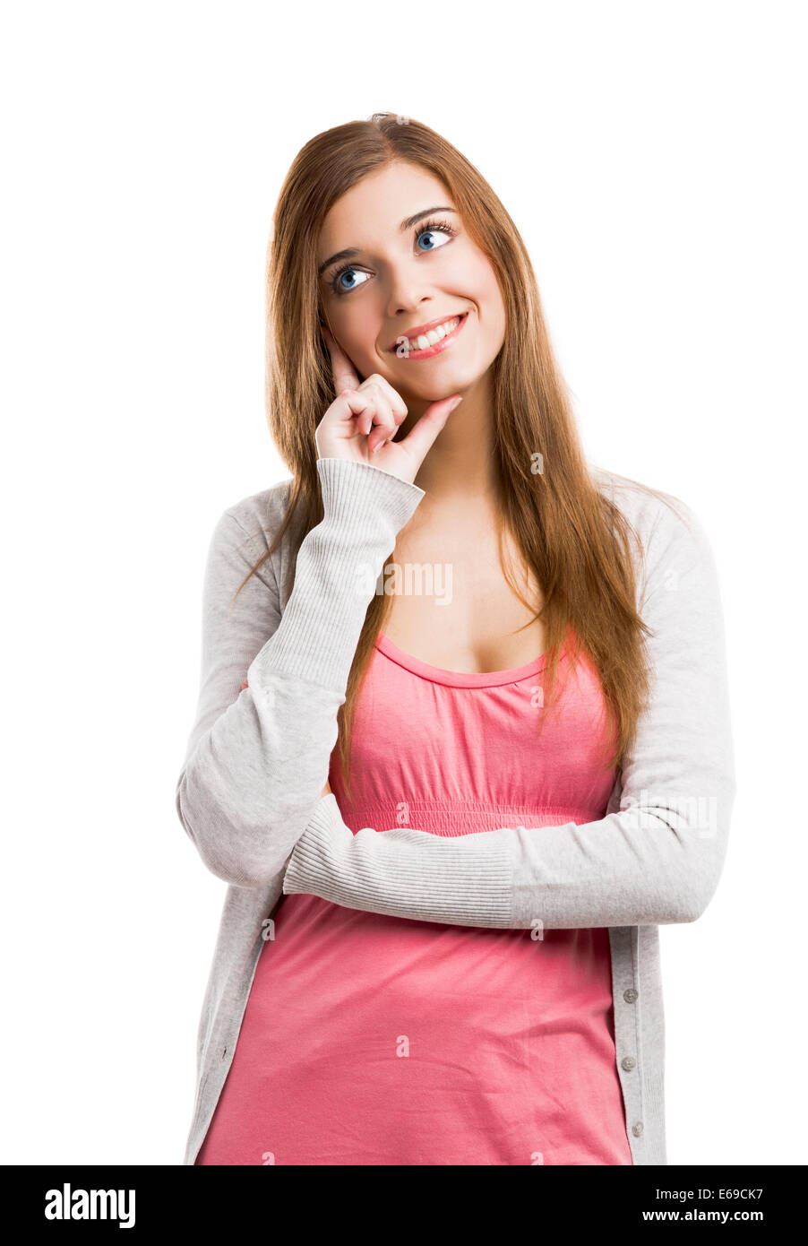 Beautiful blonde woman isolated over a white background thinking on ...