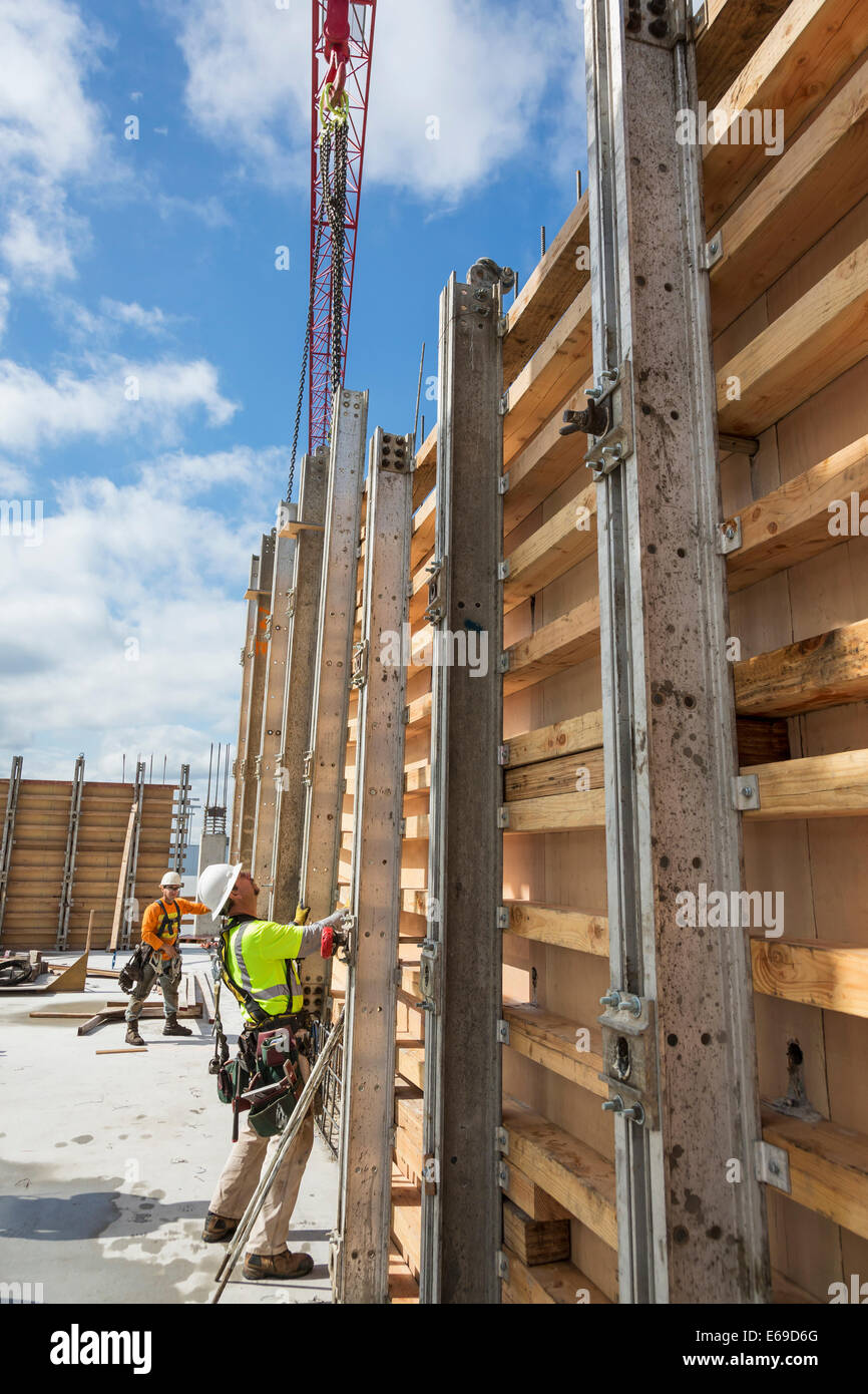 Caucasian workers at construction site Stock Photo