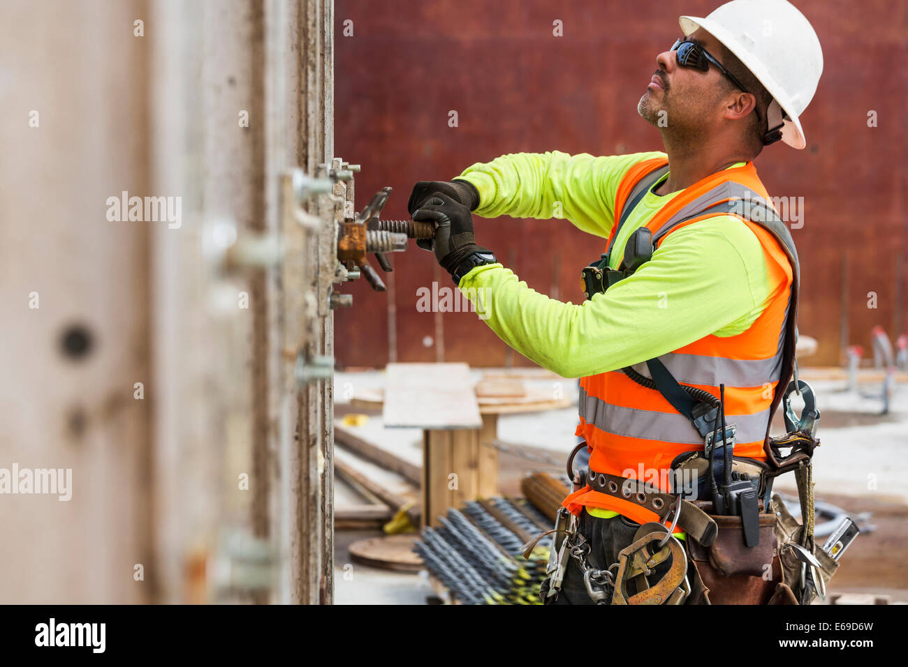 Hispanic worker at construction site Stock Photo