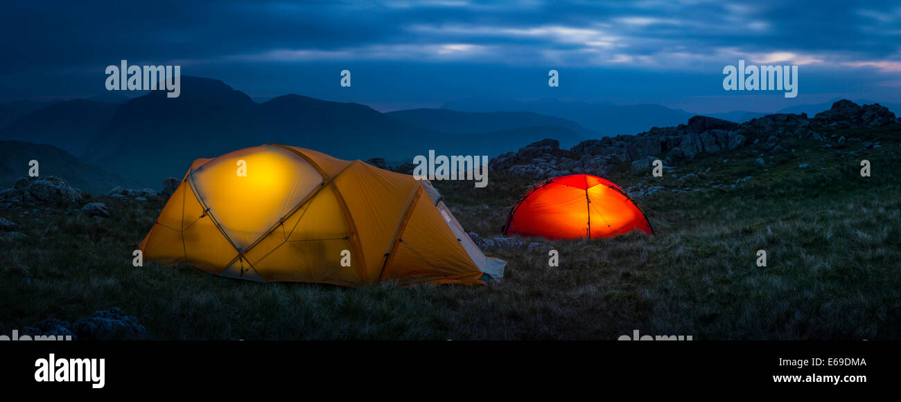 Camp tents in rocky rural landscape, Keswick, Cumbria, United Kingdom Stock Photo