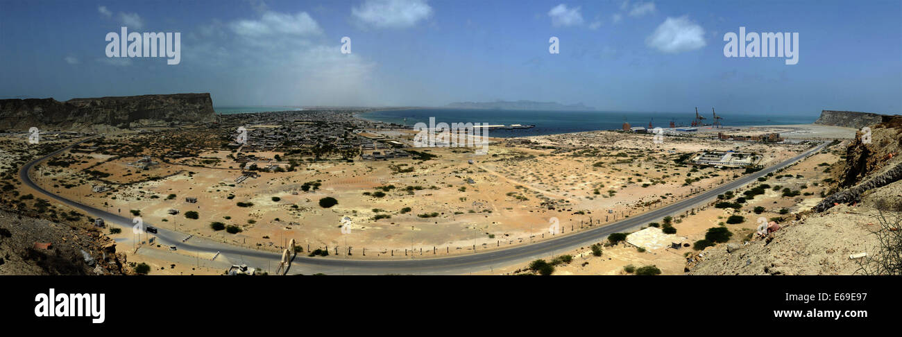 Islamabad. 18th Aug, 2014. The merged photo taken on Aug. 18, 2014 shows a view of Gwadar Port in Balochistan province, Pakistan. Gwadar Port is a warm-water, deep-sea port situated on the Arabian Sea at Gwadar in Balochistan province of Pakistan. Gwadar Port is owned by the government-owned Gwadar Port Authority and operated by China Overseas Port Holding Company (COPHC). © Huang Zongzhi/Xinhua/Alamy Live News Stock Photo