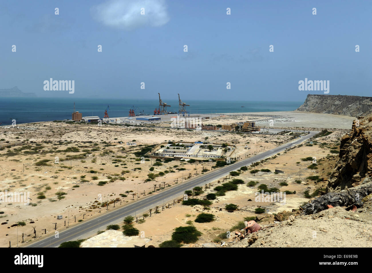 Islamabad. 18th Aug, 2014. Photo taken on Aug. 18, 2014 shows a view of Gwadar Port in Balochistan province, Pakistan. Gwadar Port is a warm-water, deep-sea port situated on the Arabian Sea at Gwadar in Balochistan province of Pakistan. Gwadar Port is owned by the government-owned Gwadar Port Authority and operated by China Overseas Port Holding Company (COPHC). © Huang Zongzhi/Xinhua/Alamy Live News Stock Photo