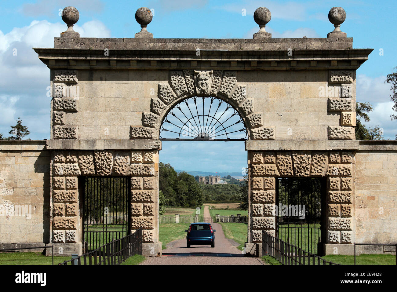 The entrance gate to Studley Royal Park looking back towards Ripon Cathedral. Studley Royal Park including the ruins of Fountain Stock Photo
