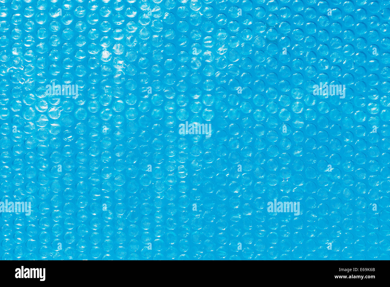 Blue background from bubble wrap hi-res stock photography and images ...