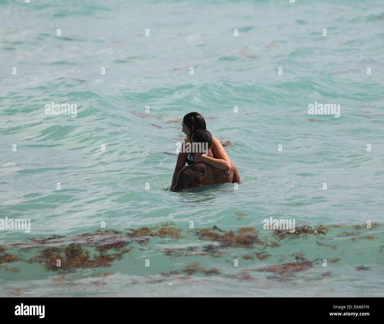 Kelly Brook and boyfriend David McIntosh relax together during their