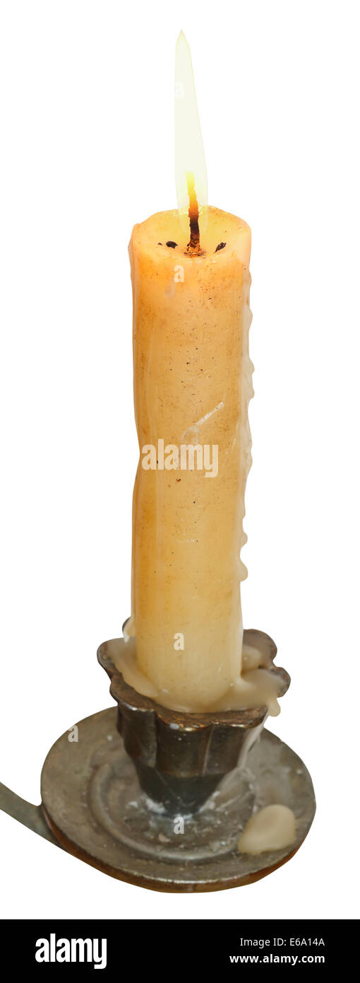 lighted candle close up in candleholder isolated on white background ...