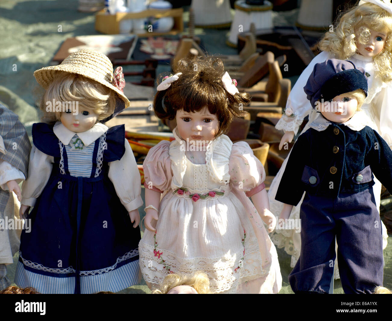 Old dolls for sale at antiques fair Stock Photo