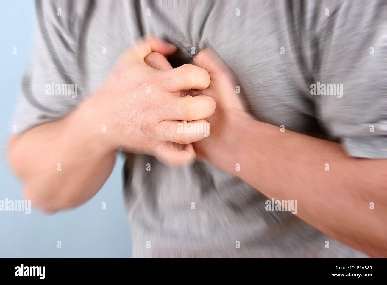 hand,heart attack,hand on chest Stock Photo