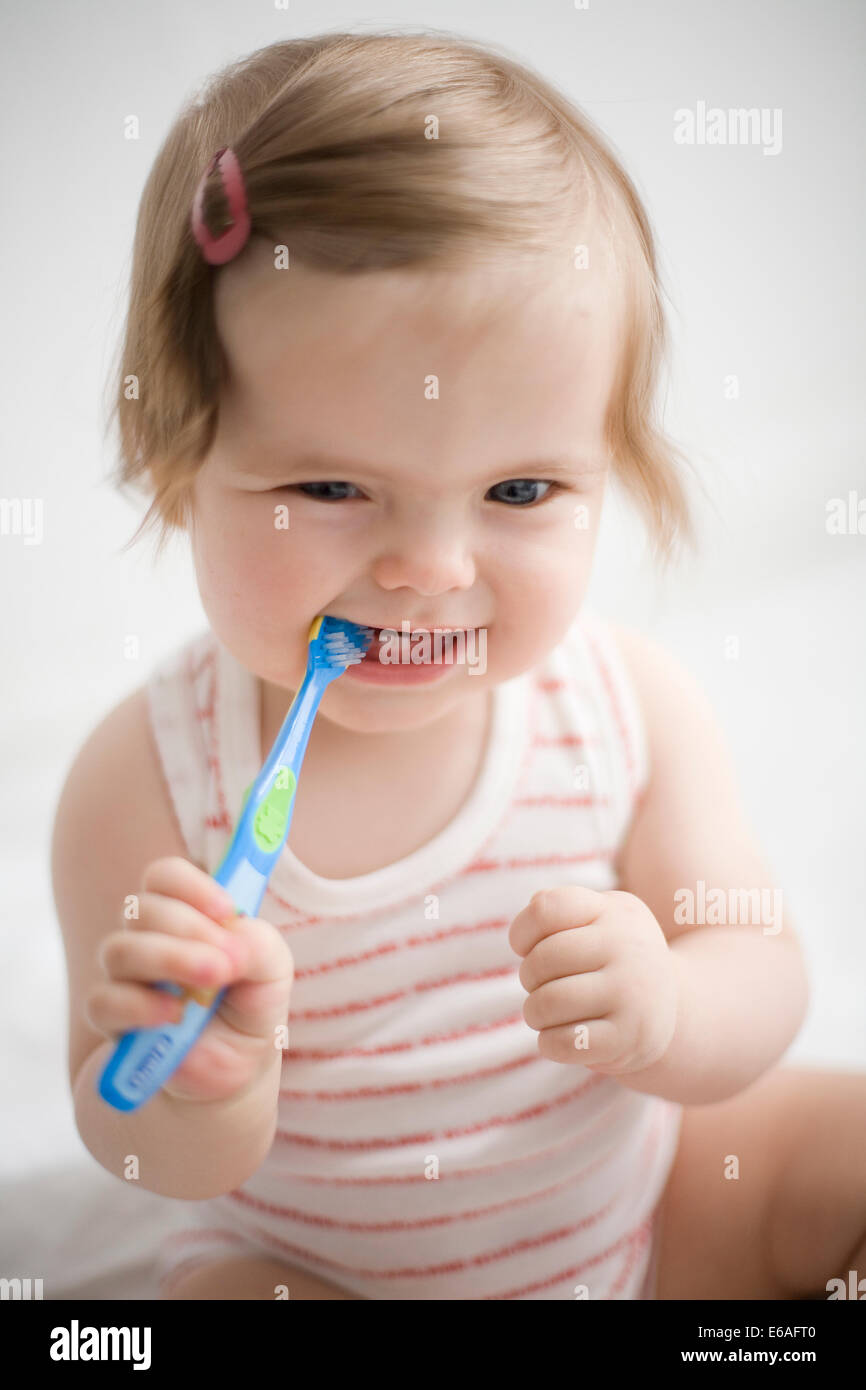 toddler,brushing teeth,teething Stock Photo