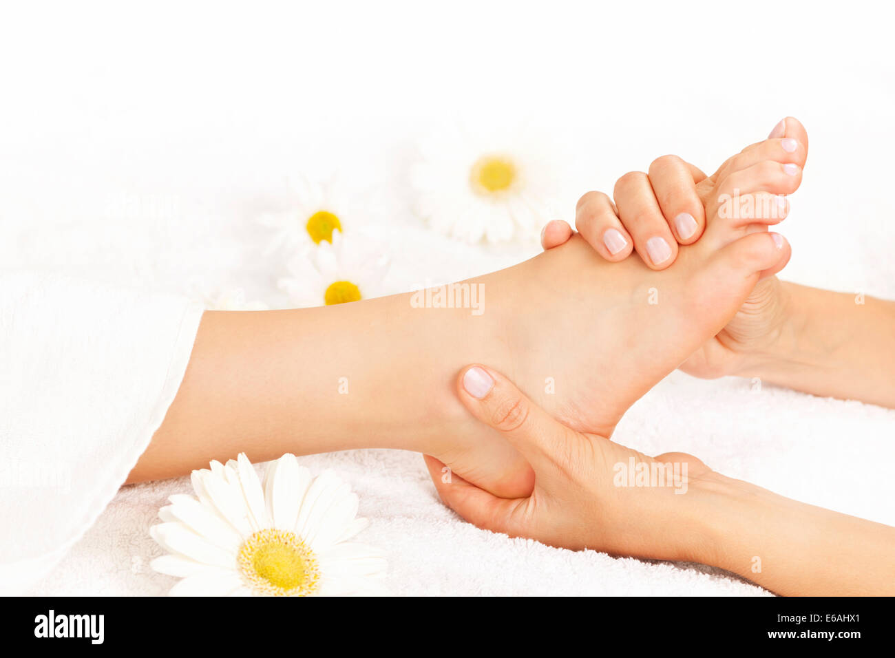 foot,massaging,massage,foot massage Stock Photo