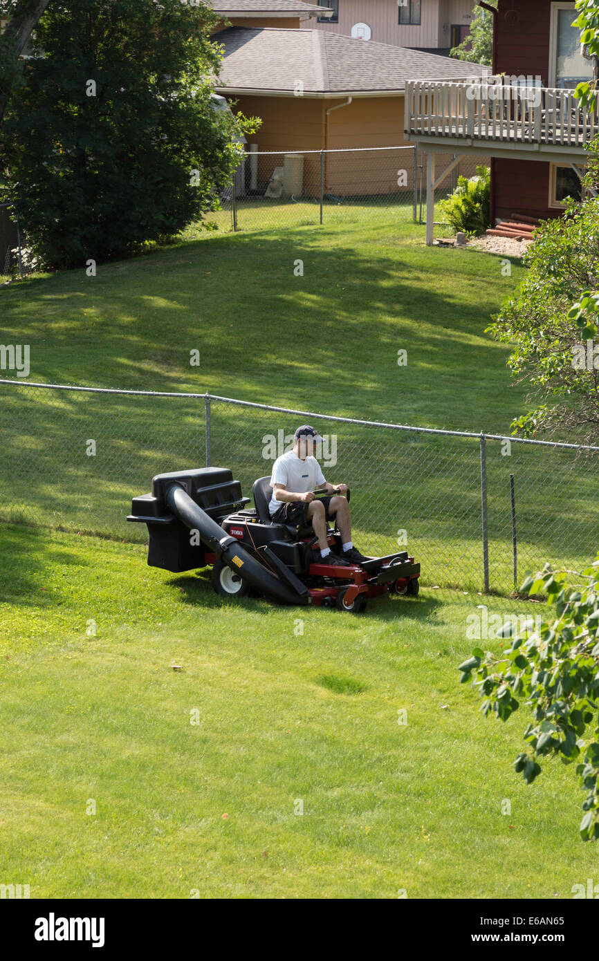 Riding lawnmower suburbs hi-res stock photography and images - Alamy