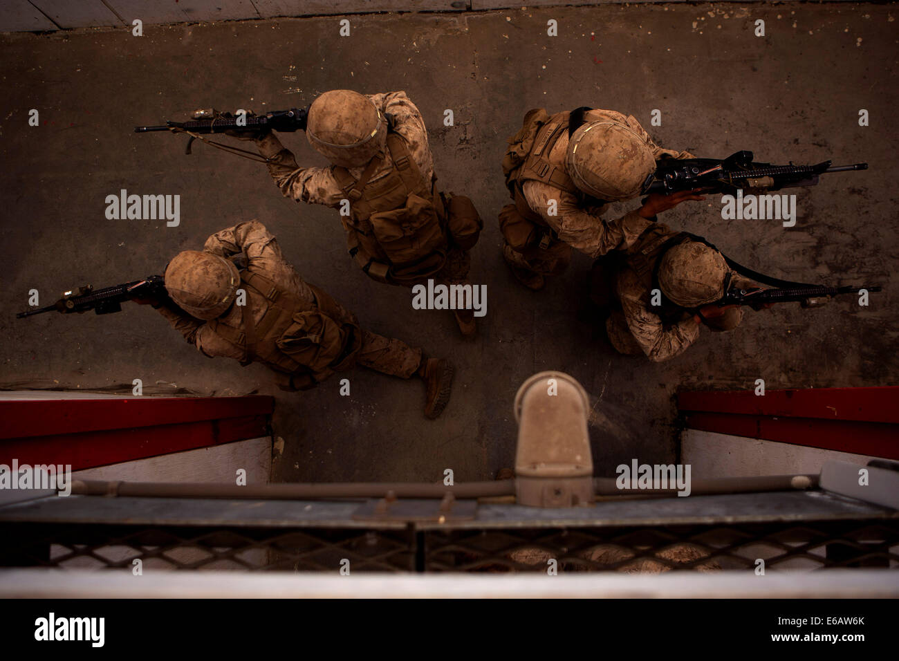 U.S. Marines with India Company, 3rd Battalion, 3rd Marine Regiment practice clearing rooms during training at the Pohakuloa Training Area in Hawaii July 22, 2014, as part of Rim of the Pacific (RIMPAC) 2014. RIMPAC is a U.S. Pacific Fleet-hosted biennial Stock Photo
