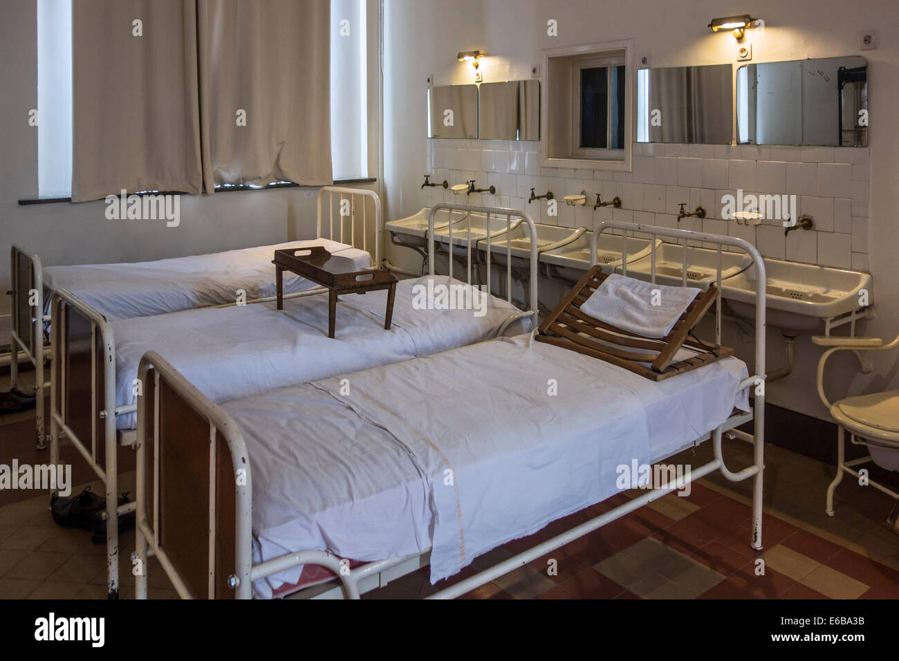 Hospital beds in the Dr Guislain Museum about the history of psychiatry in Belgium’s first psychiatric hospital in Ghent Stock Photo