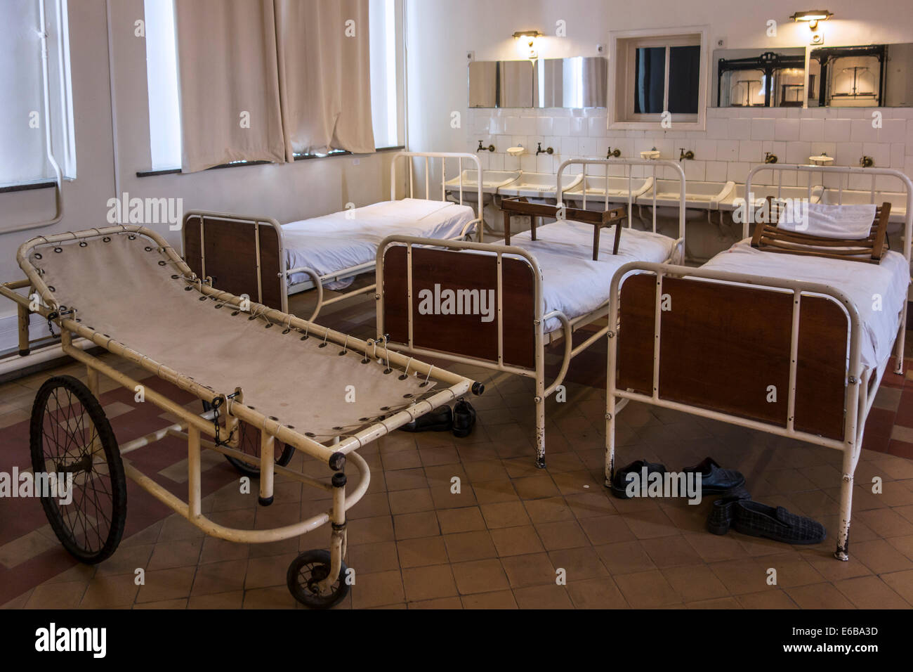 Hospital beds in the Dr Guislain Museum about the history of psychiatry in Belgium’s first psychiatric hospital in Ghent Stock Photo