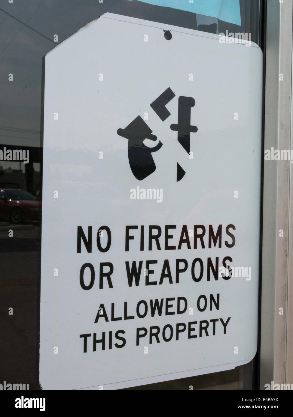 No Firearms or Weapons Allowed on this Property Sign in Montana, USA Stock Photo