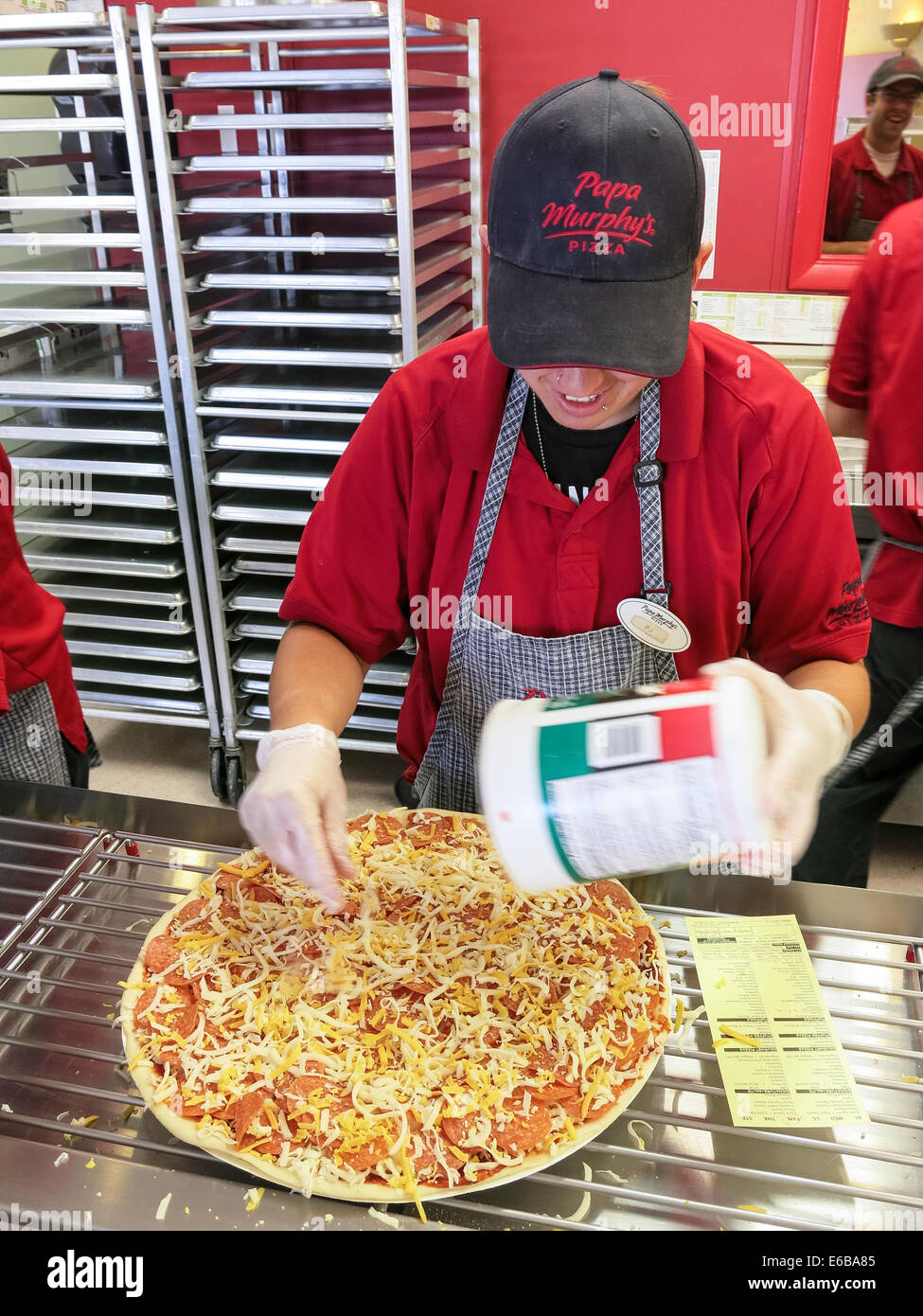 Female Employee Prepares a Pizza, Small Business, pizzeria, USA Stock Photo 72778949 Alamy