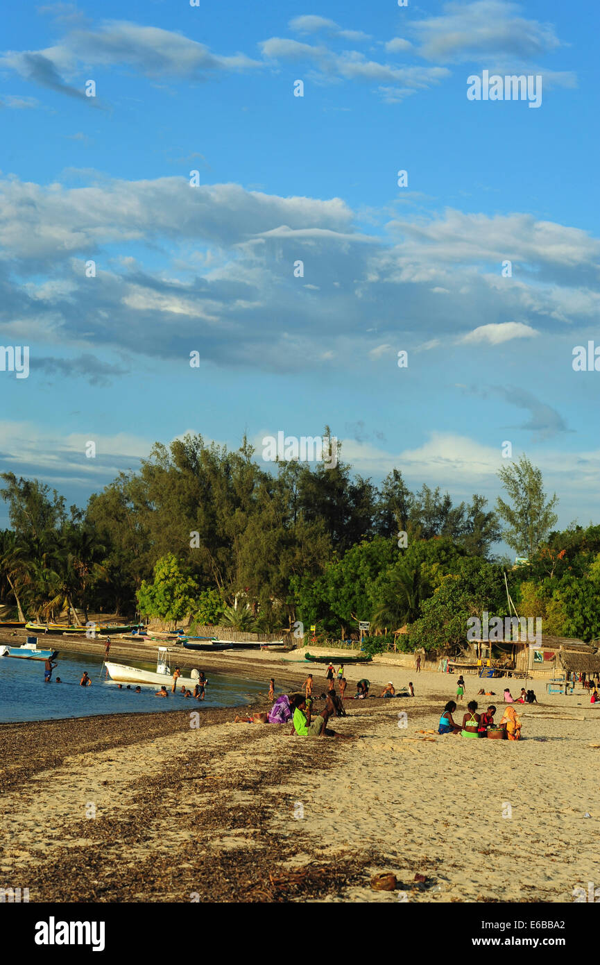 Madagascar, Tulear, Ifaty, families sitting on the beach. Stock Photo