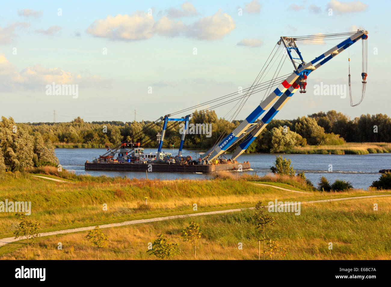 Crane Barge 'Matador' under tow on Oude Maas River Stock Photo