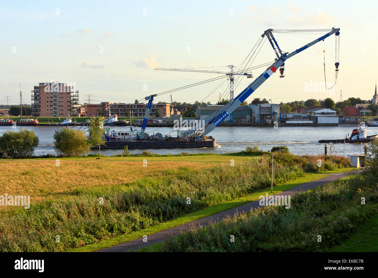 Crane Barge 'Matador' under tow on Oude Maas River Stock Photo