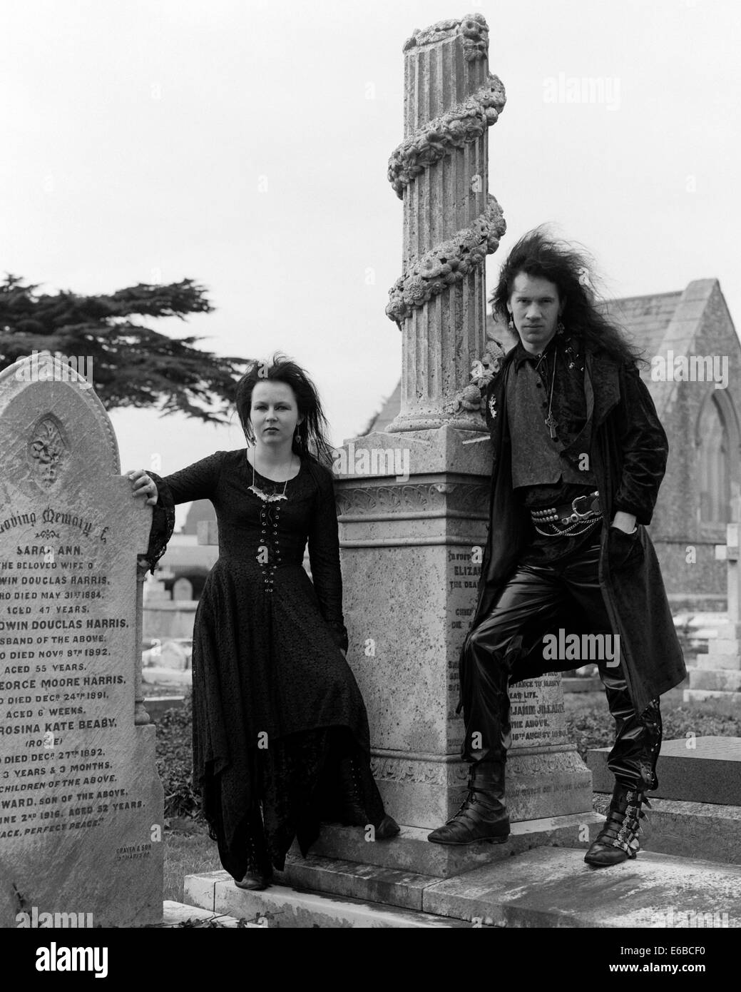 young fashionable goths dressed in black in a church graveyard portsmouth uk Stock Photo