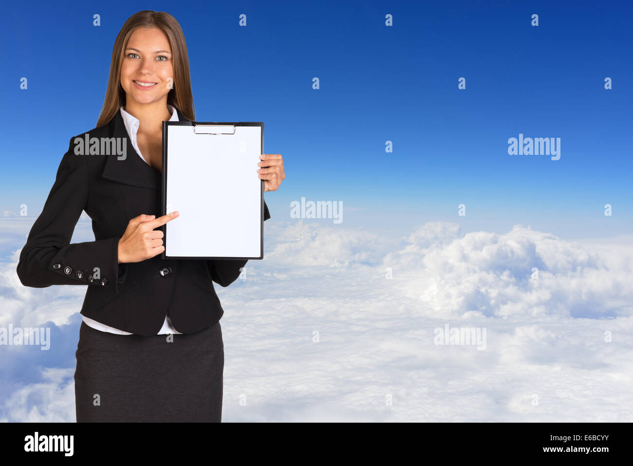 Businesswoman holding paper holder Stock Photo - Alamy