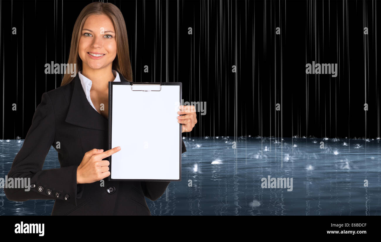 Businesswoman holding paper holder Stock Photo - Alamy