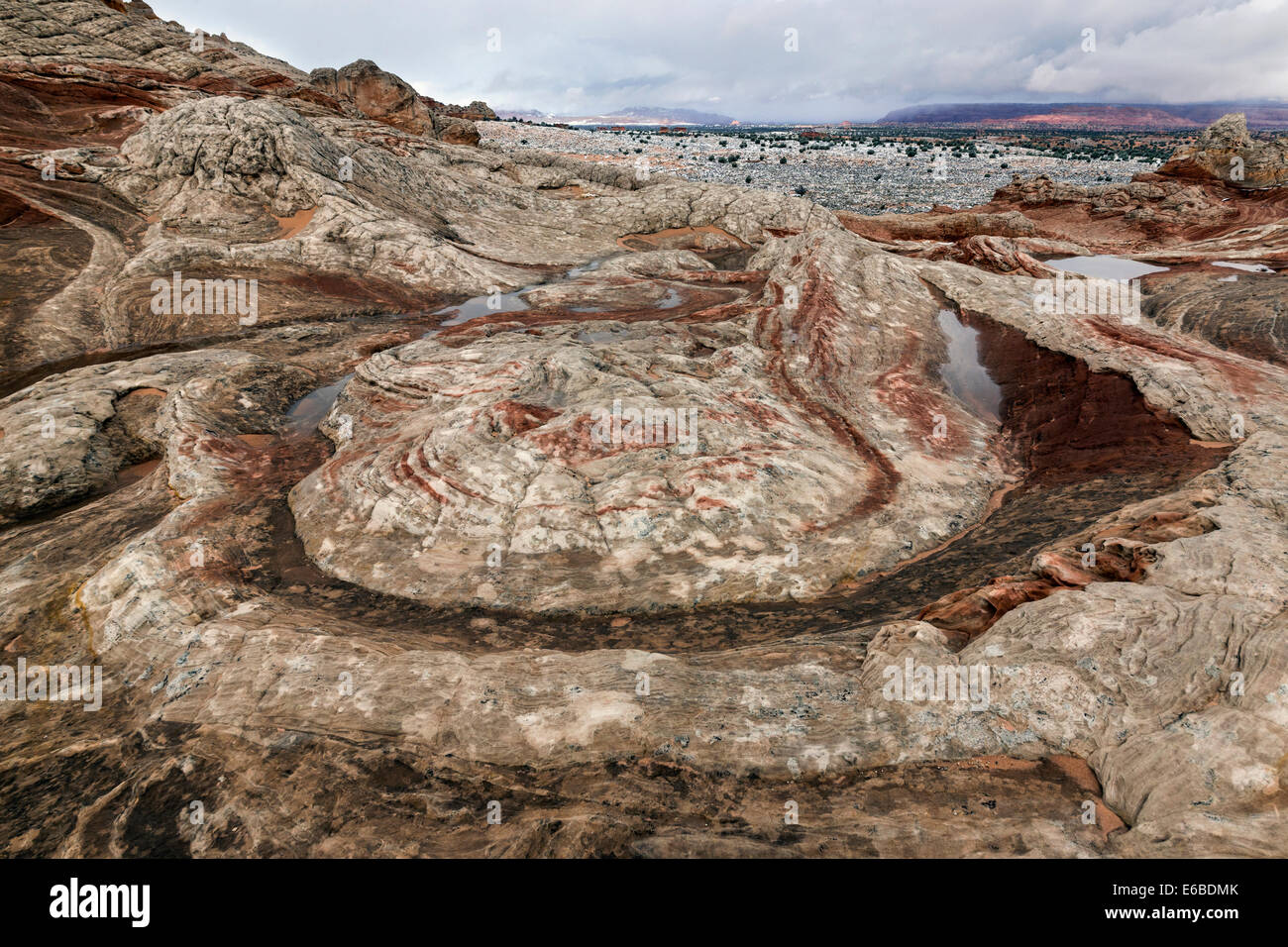 Horseshoe bend formed from snow melt, reflections and high desert