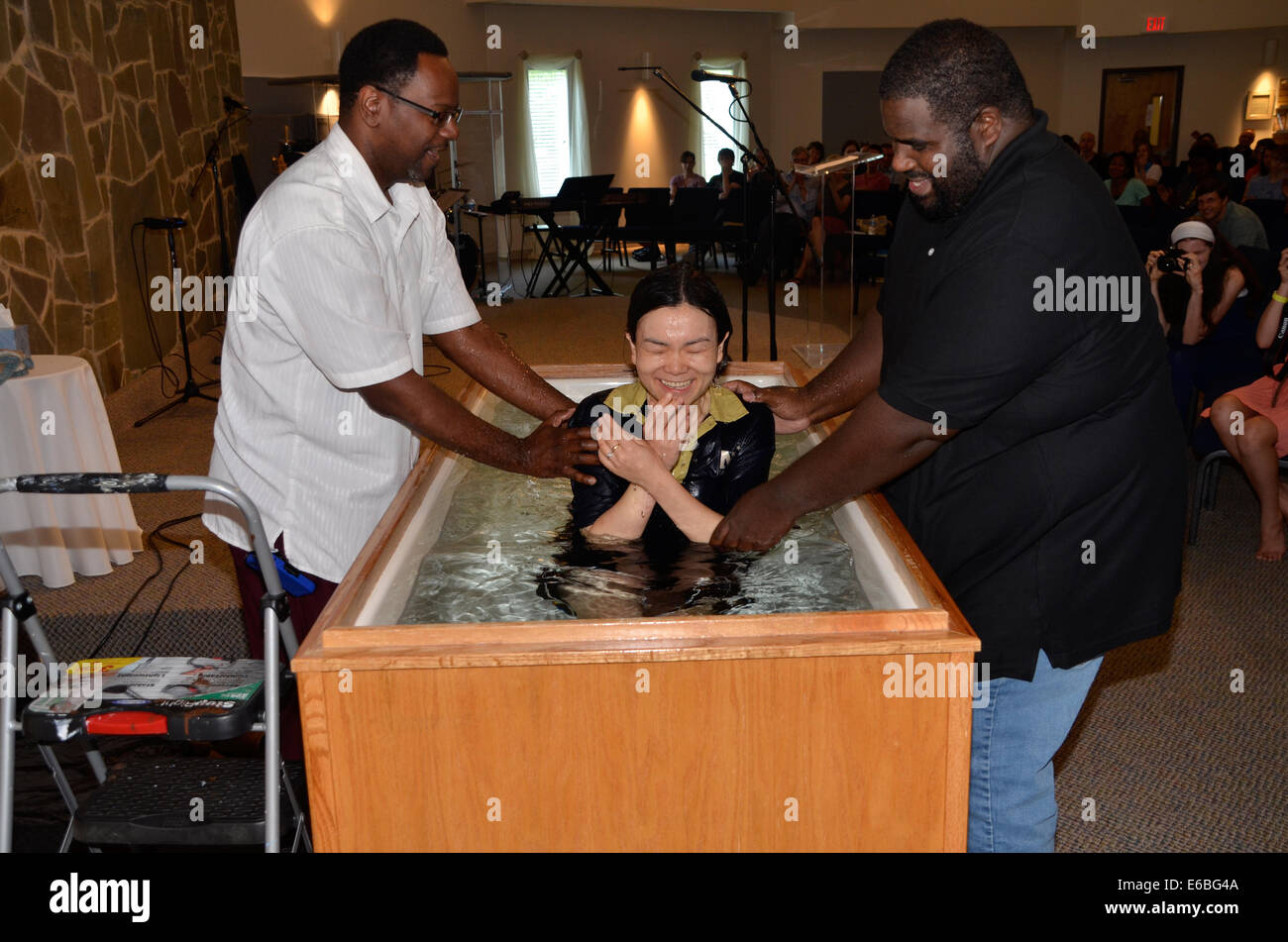 Young girl gets baptized Stock Photo Alamy