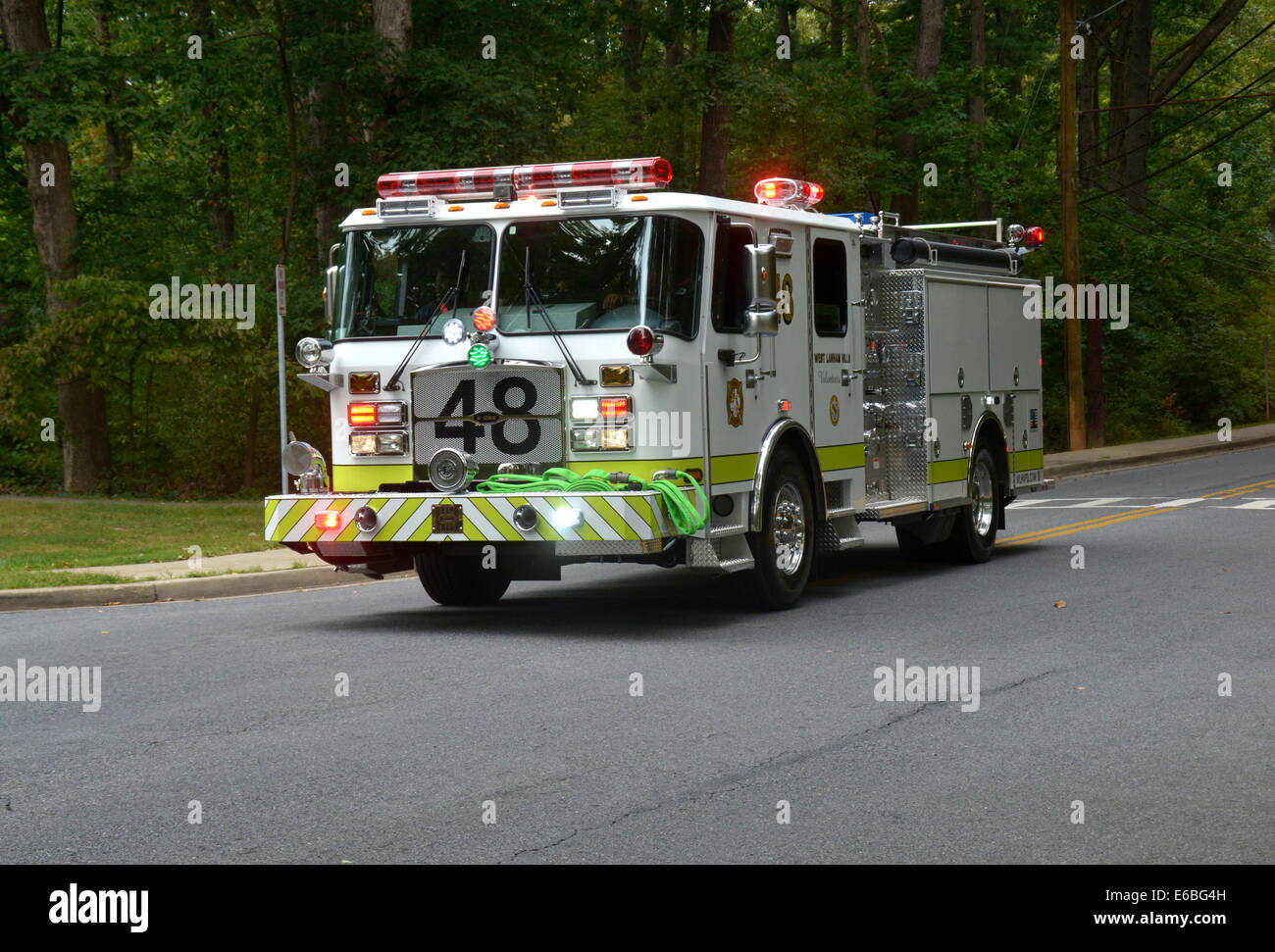 Fire Truck from West Lahnam Hills Volunteer Fire Department  responding on an emergency call Stock Photo
