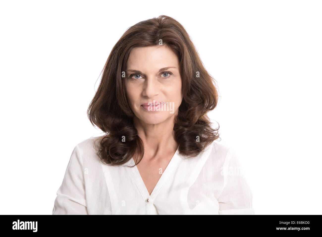 Isolated serious and doubtful mature woman in middle age. Stock Photo