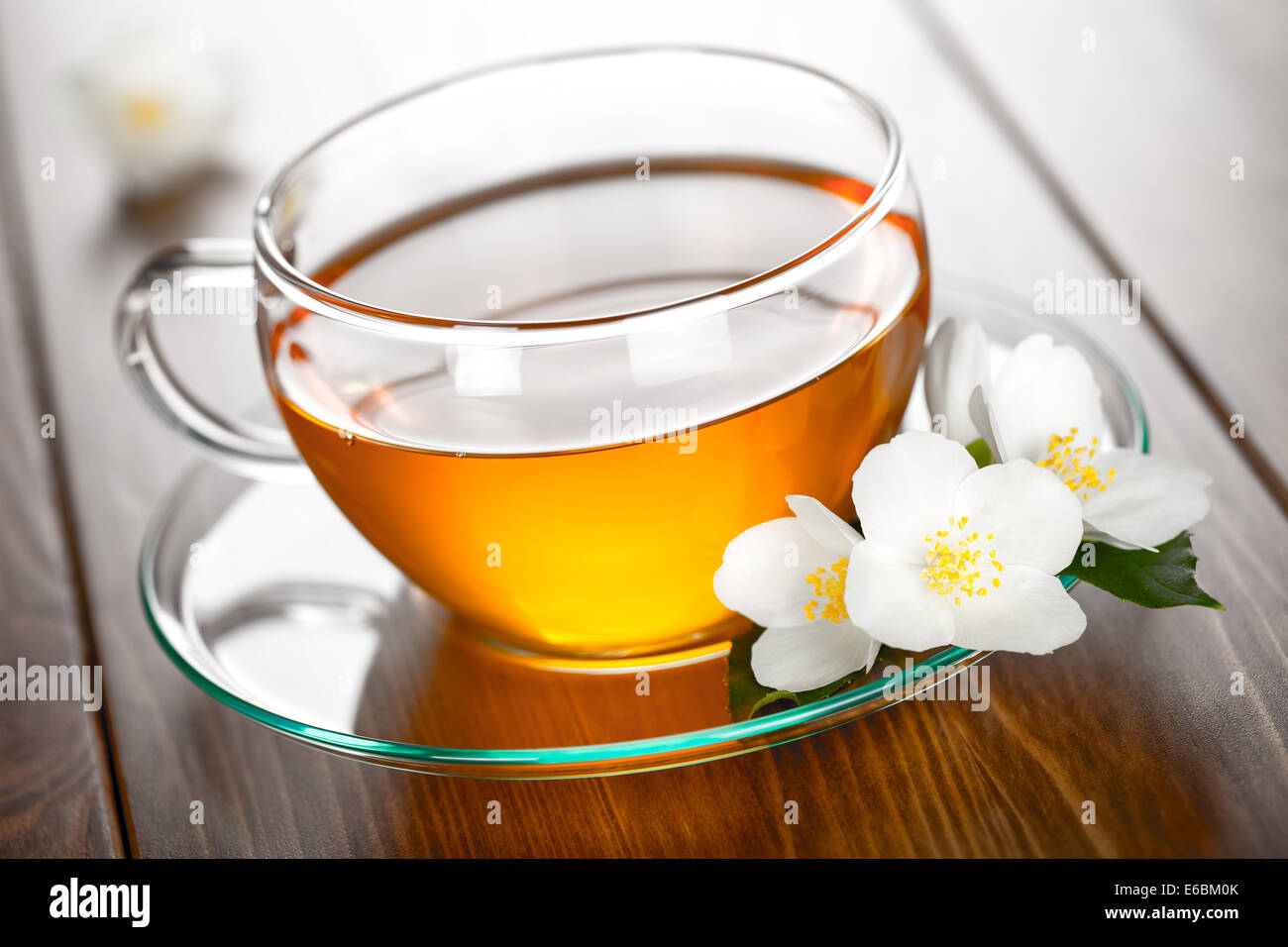 Jasmine tea with jasmine flower on table background Stock Photo Alamy