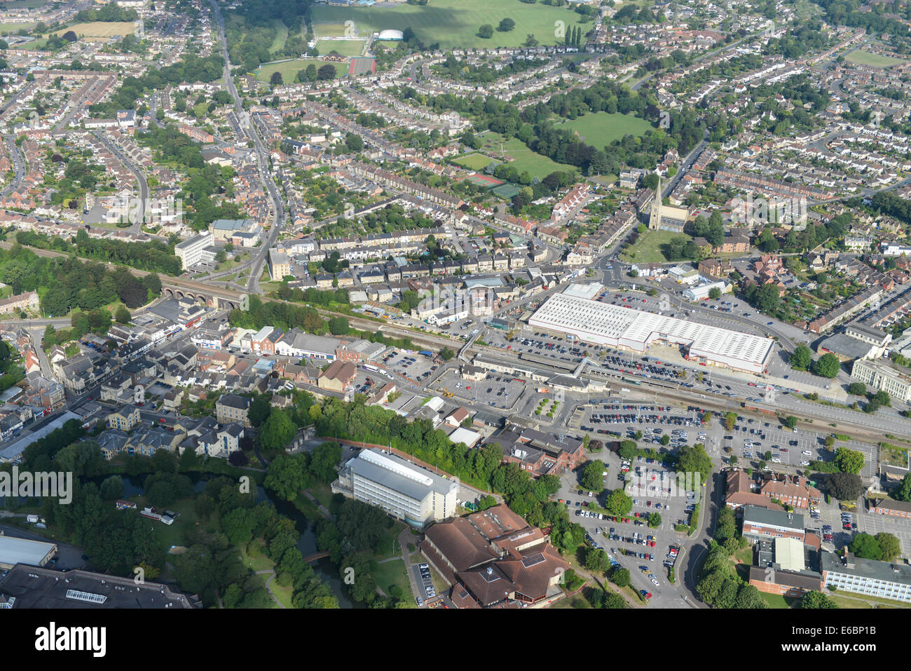 An aerial view of Chippenham in Wiltshire, UK, showing the area around the railway station and town centre. Stock Photo