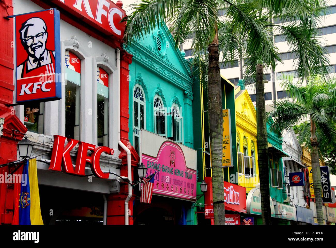 KUALA LUMPUR, MALAYSIA Colourful buildings house shops and fast food