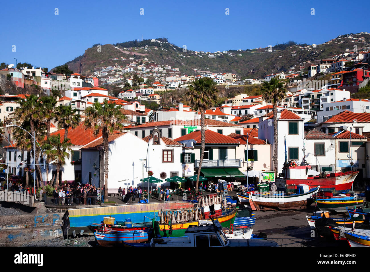Bustling tourist life in the fishing village of Camara dos Lobos, Madeira, Portugal Stock Photo