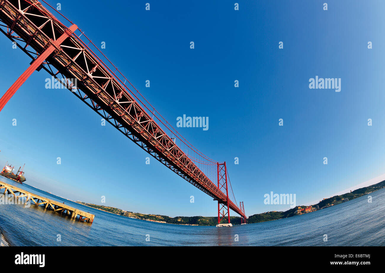 Portugal, Lisbon: Fisheye perspective of the bridge Ponte 25 de Abril Stock Photo