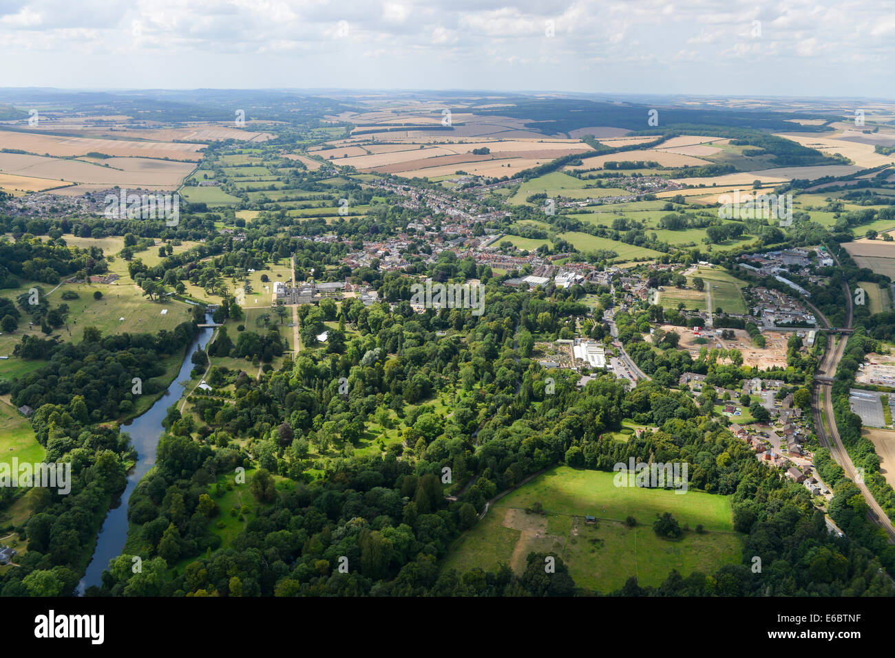 An aerial view of the town of Wilton in Wiltshire showing the River Nadder and Wilton House. Stock Photo