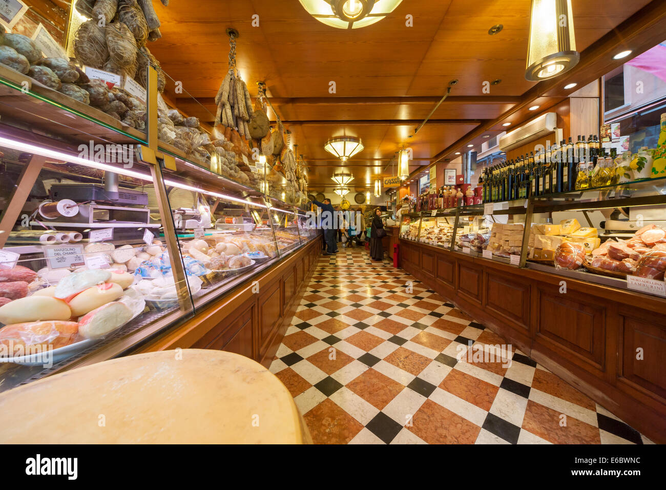 Bologna delicatessen Tamburini interior with people shopping for traditional Italian gourmet food Stock Photo